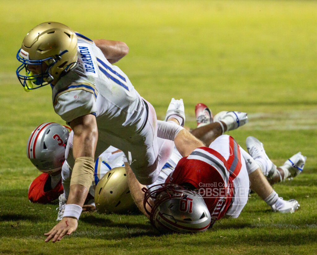 Huntingdon Mustangs quarterback Braylin Dearmon dives across the goal line for a touchdown against the McKenzie Rebels in Carroll County, Tennessee. Dearmon’s dominant night powered Huntingdon’s 41-21 win. Photo by Russell Bush/Huntingdon Sports Pics.