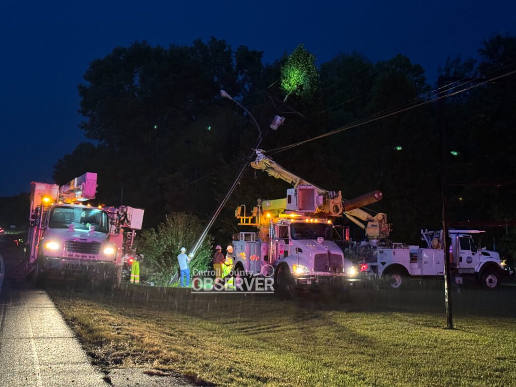 Carroll County Electric line crews repairing a downed pole in Huntingdon, Tennessee, after August 19, 2025 storms cut power to hundreds of customers. Photo by Jesse Joseph/Carroll County Observer