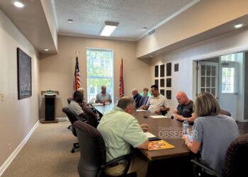 Huntingdon Town Council members seated around the table during their August 26, 2025 meeting in Huntingdon, Tennessee, discussing issues including property tax rates, sewer billing, and beer ordinance changes. Photo by Jesse Joseph/ Carroll County Observer