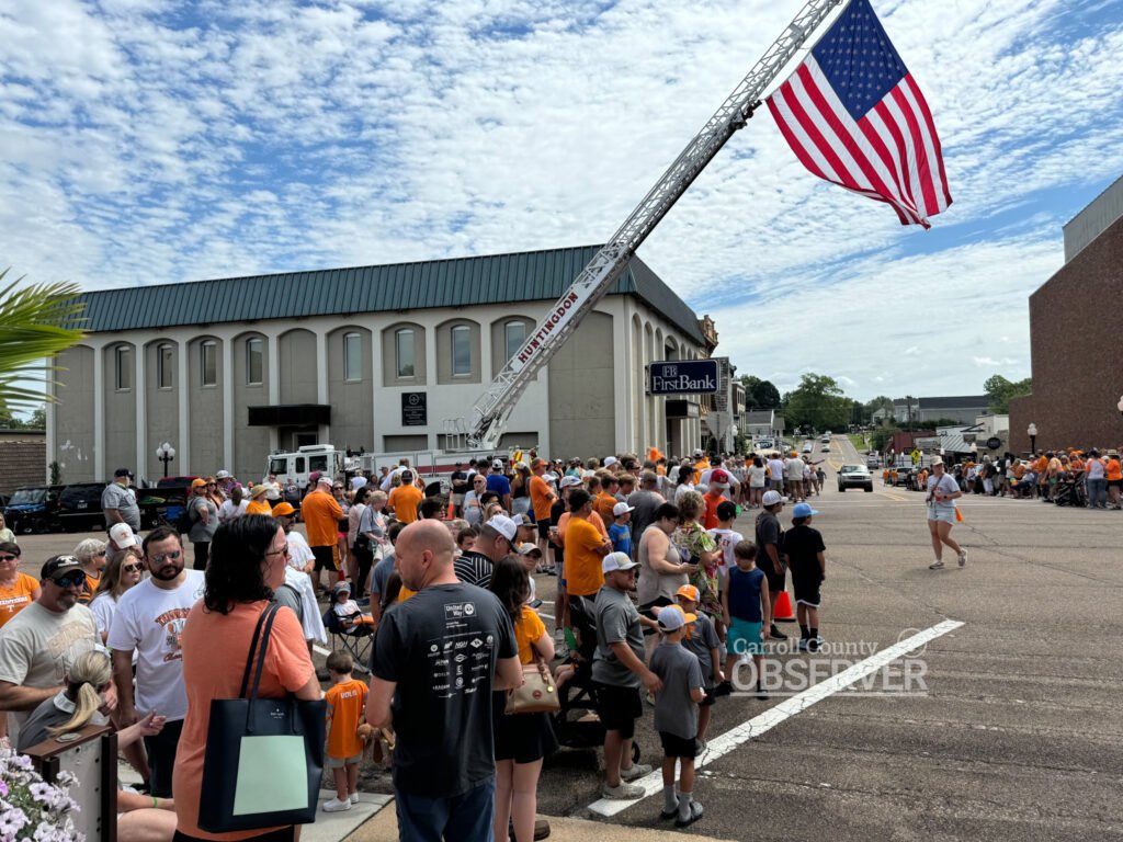 Community gathers in front of FirstBank in Huntingdon, Tennessee, to celebrate Vols baseball player Hunter Ensley in July 2024. Photo by Jesse Joseph/ Carroll County Observer