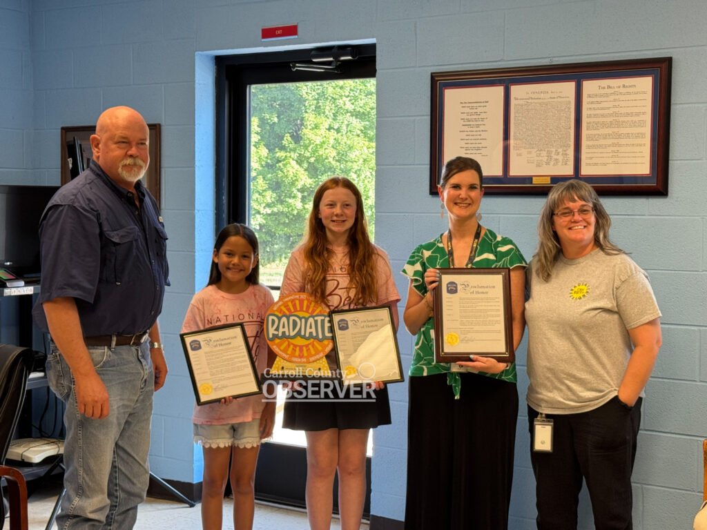 Hollow Rock–Bruceton Central Elementary students Ariella Hall and KayLynn Barrett receive proclamations from Bruceton Mayor Robert T. Keeton III for their National Beta Club Championship, with teachers Sarah Page and DeAnna Klamm. Photo by Jesse Joseph/Carroll County Observer