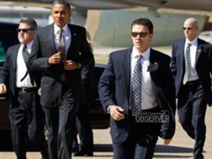 Secret Service Agent Charles Pankenier escorting President Barack Obama while serving on his protective detail. Photo courtesy Carroll County Technical Center / Carroll County Observer.