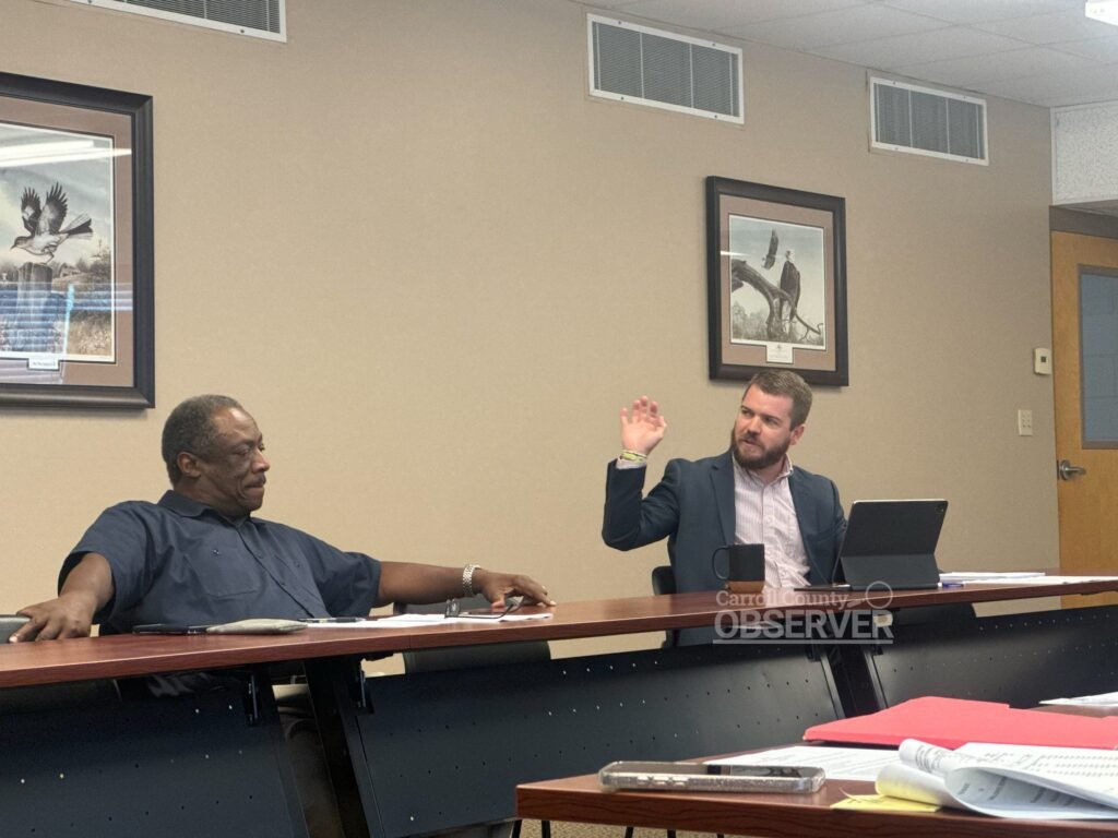 Carroll County Mayor Joseph Butler discusses the $250,000 Three Star Grant for emergency communications as Commissioner Willie Huffman listens during the Finance Ways and Means Committee meeting on August 28, 2025. Photo by Jesse Joseph/Carroll County Observer