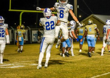 Korbin Brown of Hollow Rock-Bruceton Central celebrates a touchdown with Daegan Collins in the Tigers’ win over Fulton County.