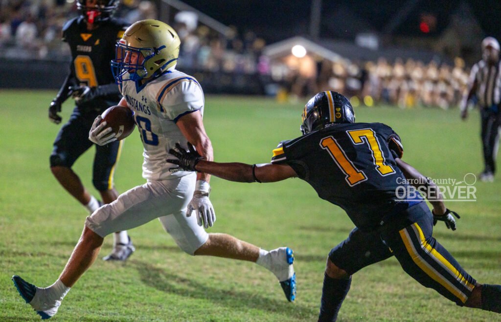 Huntingdon’s Colt Wood powers into the end zone for a touchdown, helping secure the Mustangs’ 49-6 win over Halls in Region 7-2A play.