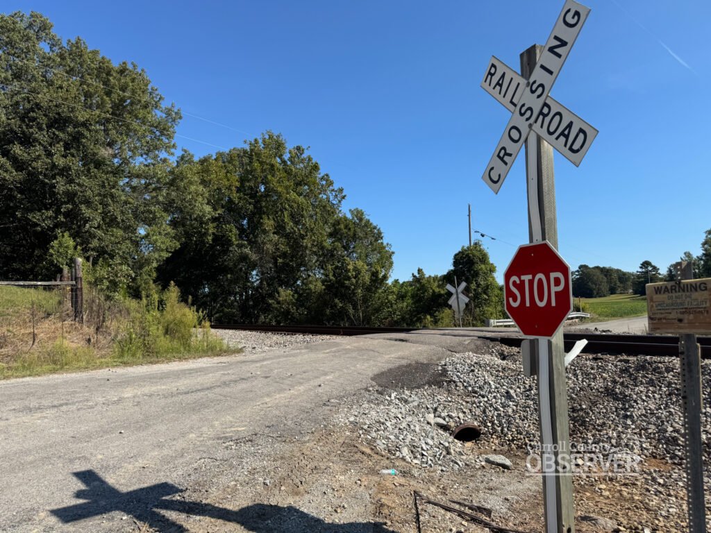 The Harris Road railroad crossing in Carroll County, Tennessee, where multiple fatal accidents have occurred in recent weeks, shown with only a stop sign and crossbuck marker, without lights or gates for added safety. Photo by Jesse Joseph/Carroll County Observer.