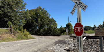 The Harris Road railroad crossing in Carroll County, Tennessee, where multiple fatal accidents have occurred in recent weeks, shown with only a stop sign and crossbuck marker, without lights or gates for added safety. Photo by Jesse Joseph/Carroll County Observer.