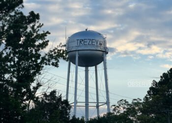 Trezevant water tower at sunset, set to be cleaned and inspected under a $4,700 bid approved by the town board in September 2025.