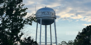 Trezevant water tower at sunset, set to be cleaned and inspected under a $4,700 bid approved by the town board in September 2025.