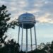 Trezevant water tower at sunset, set to be cleaned and inspected under a $4,700 bid approved by the town board in September 2025.