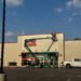 Workers remove Dollar Tree signs from the Family Dollar combo store in Bruceton, Carroll County, Tennessee, on September 17, 2025, after the national retailer’s $1 billion Family Dollar sale and widespread store closures.