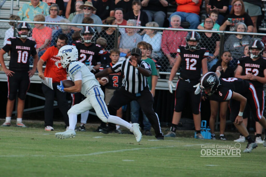 Hollow Rock-Bruceton receiver Brady Roberts breaks away down the sideline for a first-quarter touchdown against Gleason. Photo by Jesse Joseph/Carroll County Observer.