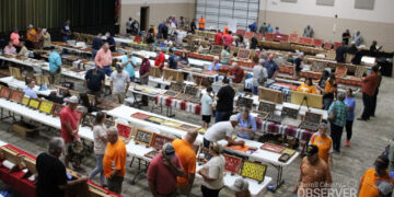 Wide view of the main floor at the Jimmy French Memorial Artifact Show with hundreds of visitors and more than 100 tables of artifacts. Photo by Jesse Joseph/Carroll County Observer.