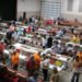 Wide view of the main floor at the Jimmy French Memorial Artifact Show with hundreds of visitors and more than 100 tables of artifacts. Photo by Jesse Joseph/Carroll County Observer.