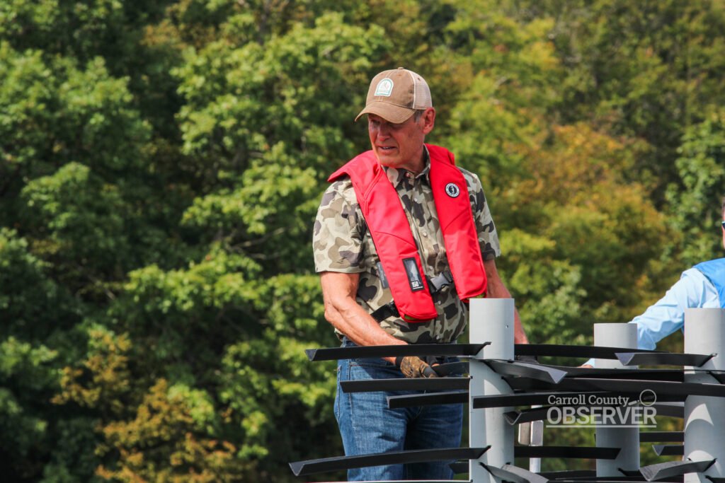 Governor Bill Lee works with Tennessee Wildlife Resources Agency staff to place artificial fish attractors in Lake Halford, part of ongoing conservation improvements. Photo by Jesse Joseph/Carroll County Observer.