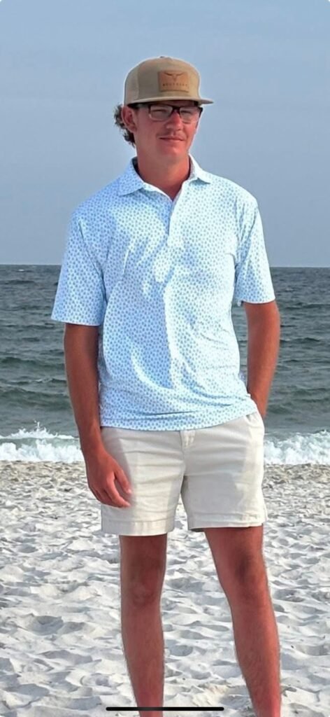 Luke Scott, who turned 18 in July and worked as a lineman for Drewry Communications, was killed in a train collision in McKenzie, Tennessee. He is pictured during a recent trip to the beach.