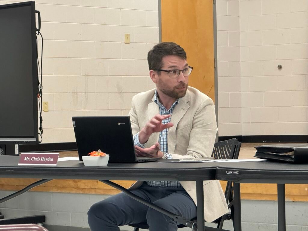 Chris Hayden, attorney for the West Carroll Special School District, speaks to board members while providing a legal update on a developing lawsuit concerning textbook publishers and pricing rules. Photo by Jesse Joseph/Carroll County Observer