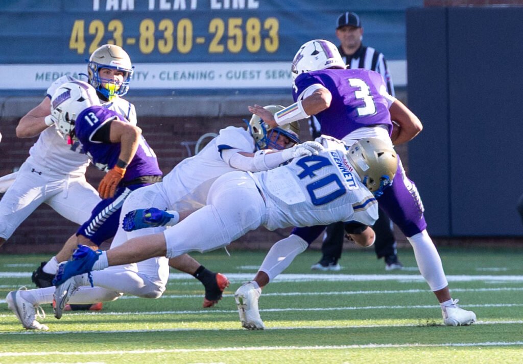 Broox Bennett attempts to bring down Marion County’s Zaiden Humphrey during Huntingdon’s victory in the 2025 TSSAA BlueCross Bowl state championship game in Chattanooga, Tennessee.