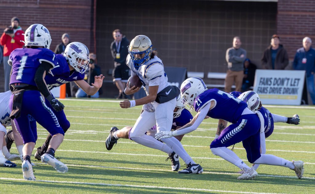 Kenton Smith carries the ball for Huntingdon during the Mustangs’ win over Marion County in the 2025 TSSAA BlueCross Bowl state championship game in Chattanooga, Tennessee.