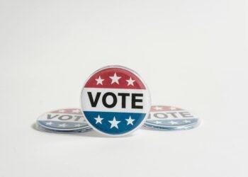 Close-up of a vote button symbolizing election participation and democracy.