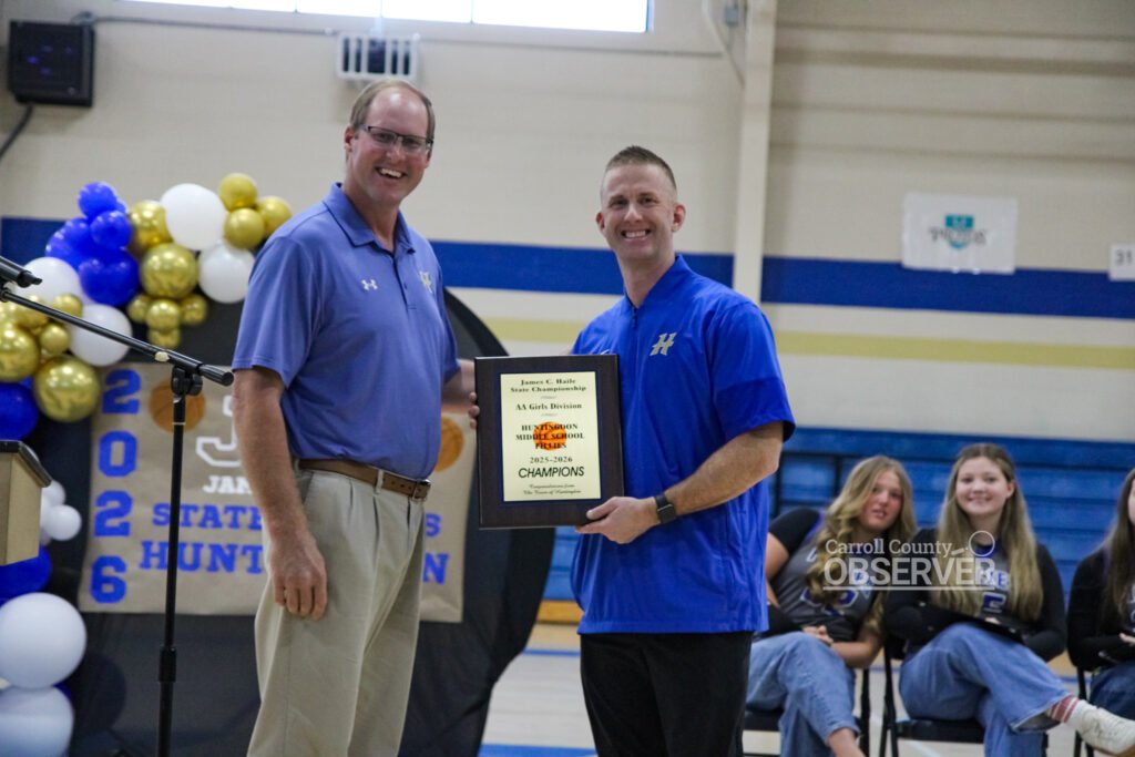Chad Edwards and HMS Fillies head coach David Wilkins holding state championship plaque together.