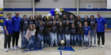 Huntingdon Middle School Fillies basketball team group photo with state championship trophy at Bill Ezell-David Hale Gymnasium.