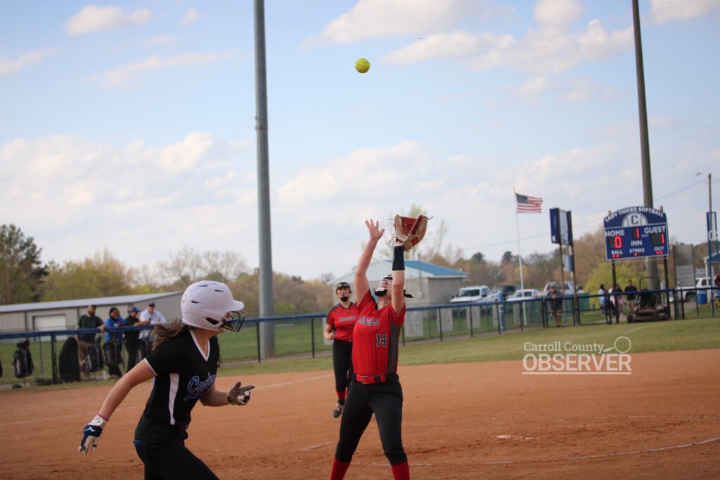 McKenzie softball player catching a pop fly at Central High School