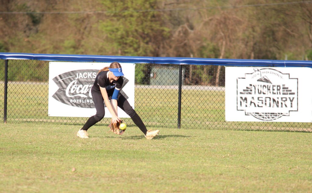 Central Lady Tigers outfielder Emy Olds fielding a ground ball
