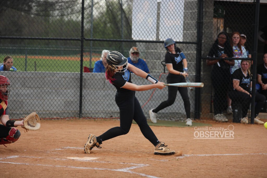 Central Lady Tigers Abby Baker hitting a double against McKenzie