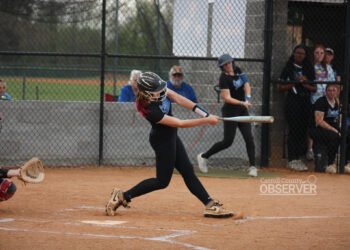 Central Lady Tigers Abby Baker hitting a double against McKenzie