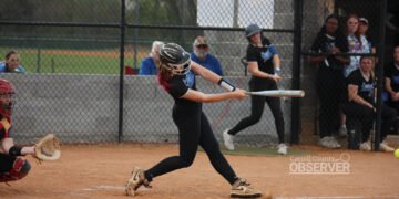 Central Lady Tigers Abby Baker hitting a double against McKenzie