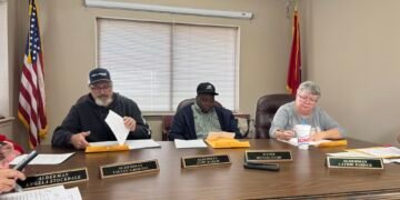 Hollow Rock aldermen sit at the board table during the March 17 meeting.
