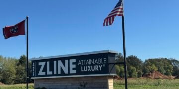 Zline Kitchen sign with Tennessee and American flags at the company's Carroll County location.