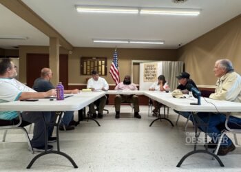 Members of the Atwood Board of Mayor and Aldermen seated at tables during a special-called meeting at Atwood City Hall.