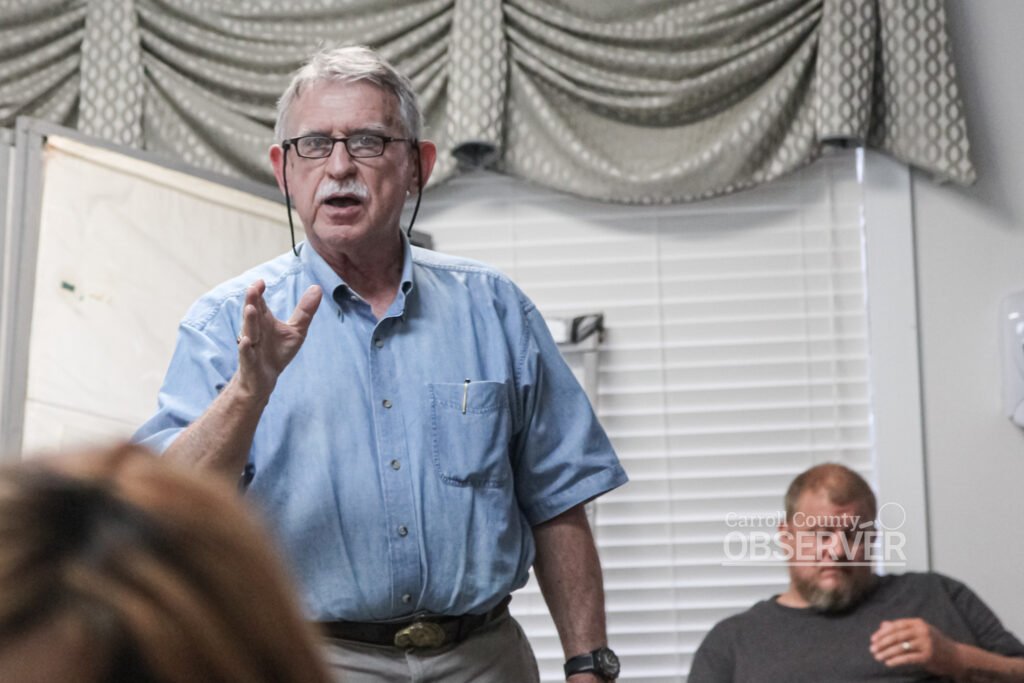 Town Attorney Charles Trotter standing and gesturing while addressing Trezevant board at August 2026 meeting.