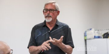 Alderman Don Barger standing and speaking at Trezevant board meeting August 2026 with another board member visible to his left.
